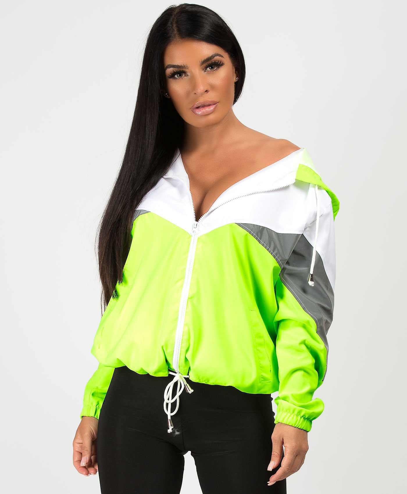 Lime green shop and black windbreaker